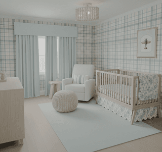 Light blue nursery with plaid walls, crib, white chair, dresser, and woven ottoman.