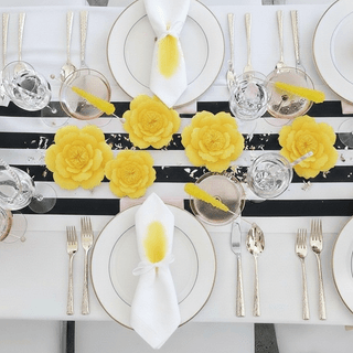 black-and-white-tablescape-with-yellow-centerpiece.jpg