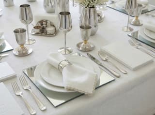 Ensure the paragraph text surrounding the images on your page uses related keywords like Passover tablescape ideas," "silver Seder decor," or formal holiday hosting.