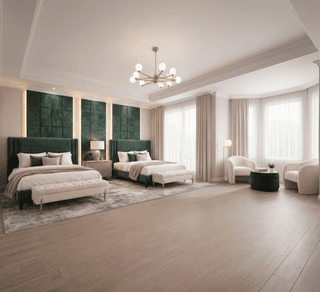 Emerald upholstered bed styled with neutral bedding and a tufted bench with gold legs at the foot