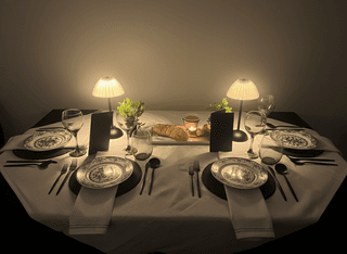 Elegant dining table set for two, illuminated by lamps and candlelight.